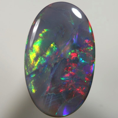 SOLID SEMI BLACK OPAL Bright cherry red to golden fire. SEE VIDEO